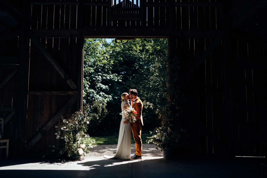 bride and groom in ceremony barn at nancarrow
