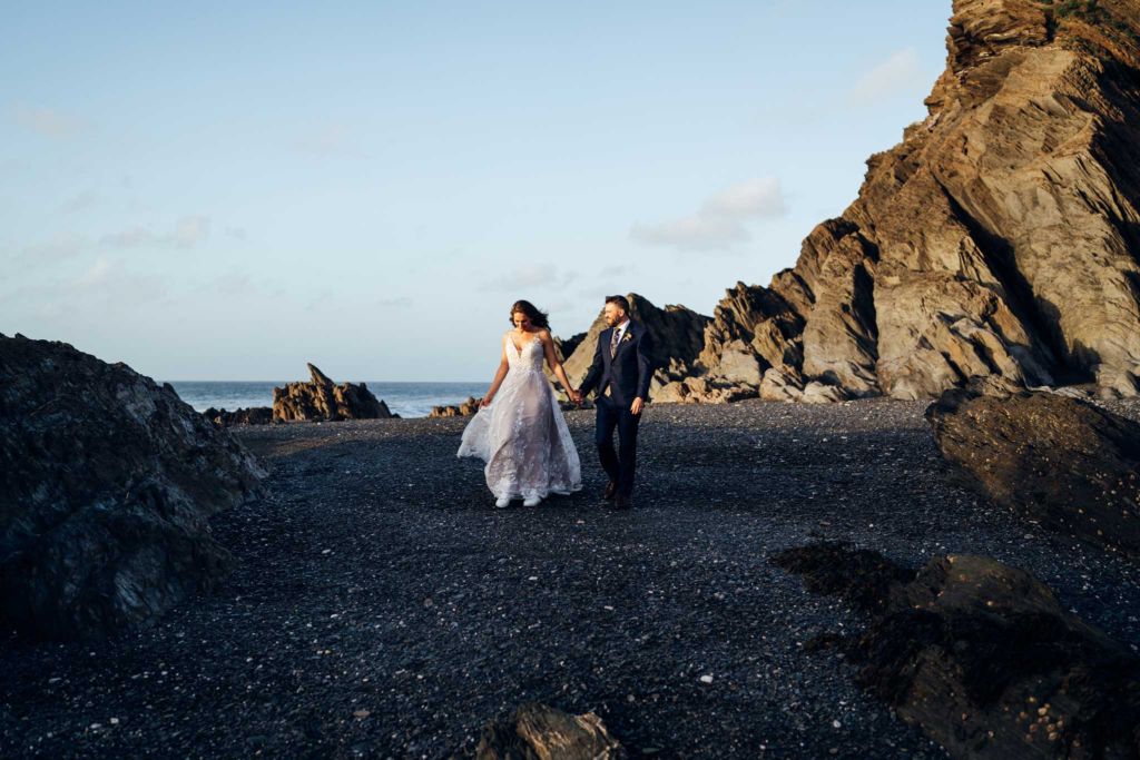 Bride and groom on Devon Beach